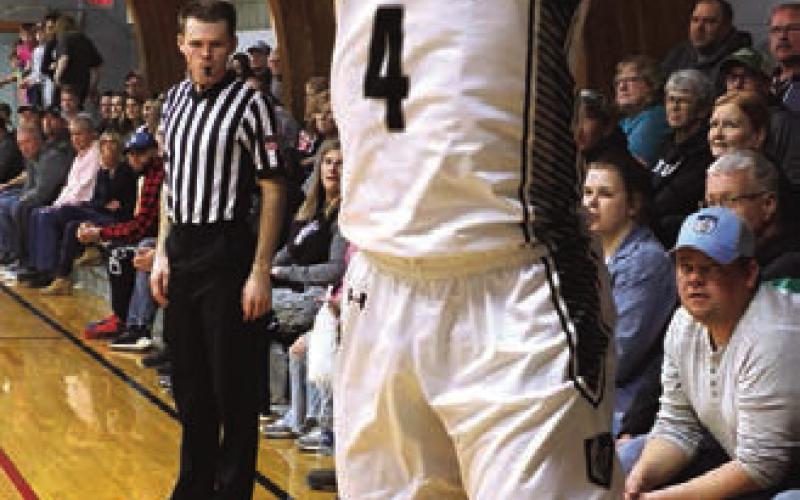 Charlie Kittelson tries a 3 pointer against Larimore.