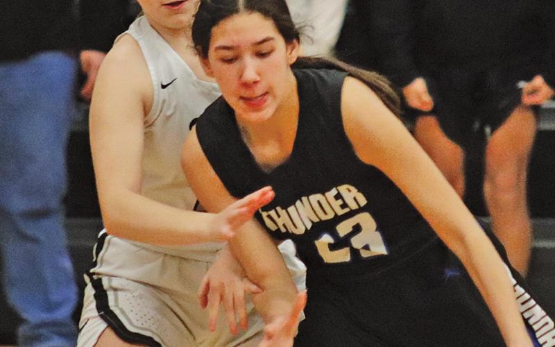 Aleah Pokrzywinski attemps the steal against Thunder player Stella Sehrt in Drayton last Friday night. VNV photo by Lesa Van Camp