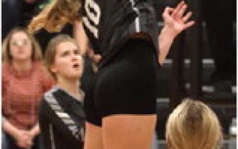 Easton Larson puts down a kill attempt in action against Thompson in Drayton last week.