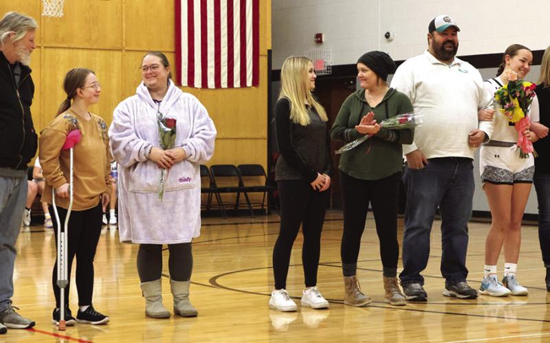 The Titan's celebrated Senior Night on Thursday evening of last week in the Drayton gym. Pictured from the left are; Stephen, Siobhan, and Lindsay Kissee; Claire and Kayla Thompson, Mike Berg, Hailey Berg, and Barb Sapa