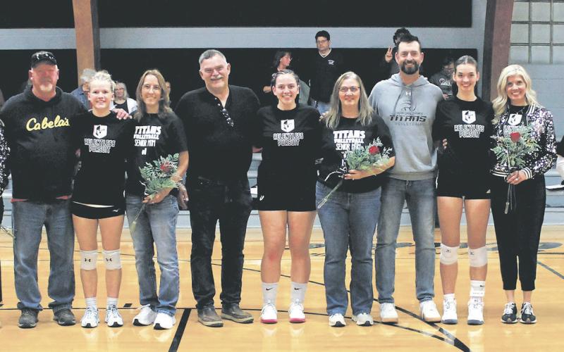 DVE seniors and their parents were recognized prior to Monday's game in Crystal. Pictured with their parents are seniors Brooke Gullickson, Alyssa Hoyles, Christine O'Toole, Elizabeth Fedje, and Raelyn Knutson. Photo by Jamie Rarick.