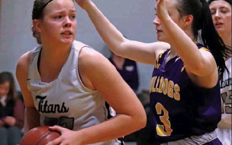Kasey Stegman got the rebound and then looks for an open man during the action against the Rolla Bulldogs Saturday afternoon in Crystal. VNV Photo by Lesa Van Camp