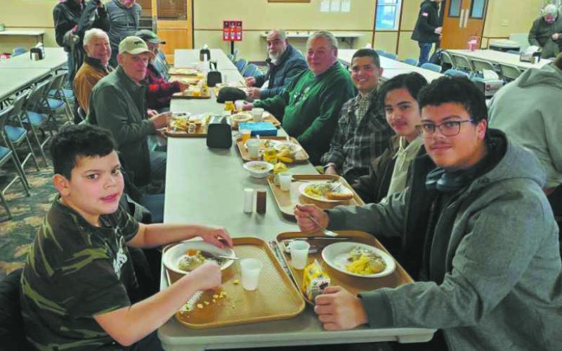DeSousa boys enjoying breakfast together a the Bible camp in Devils Lake; Noah, Daniel, and Lucas. Submitted photo