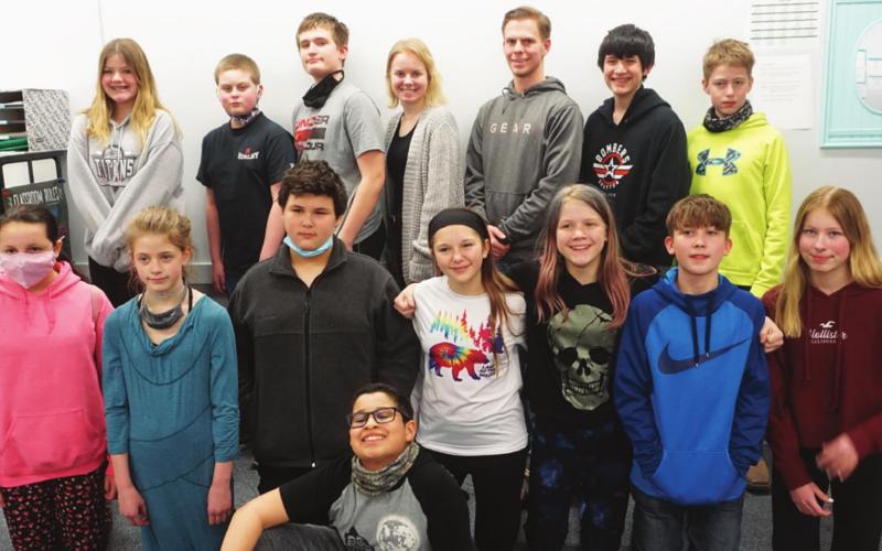 The Seventh-Grade class posses with Andrew and Genna Holm on Friday. Back row, from the left: Alyvia Quibell, Jaxon Wilson, Grant Uggerud, Genna Holm, Andrew Holm, Trypp Castillo, Ryan Corrick. Middle row: Kayden Swanson, Stephanie Kissee, Tyler Thompson, Taylor Hermanson, Alyssa Hoyles, Hunter Sherrill, and Paige Morris. Front: Jerimiah Johnson. VNV photo by Lyle Van Camp