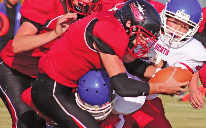 Cameron Walker gets across the end zone despite the best efforts of the Center Stanton Wildcats to stop him. VNV Photo by Lesa Van Camp