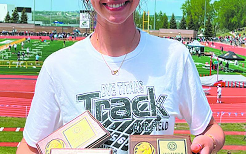 Elizabeth Fedje landed first place in the high jump, second in the 300 meter hurdles and eighth in javelin. Submitted photo.