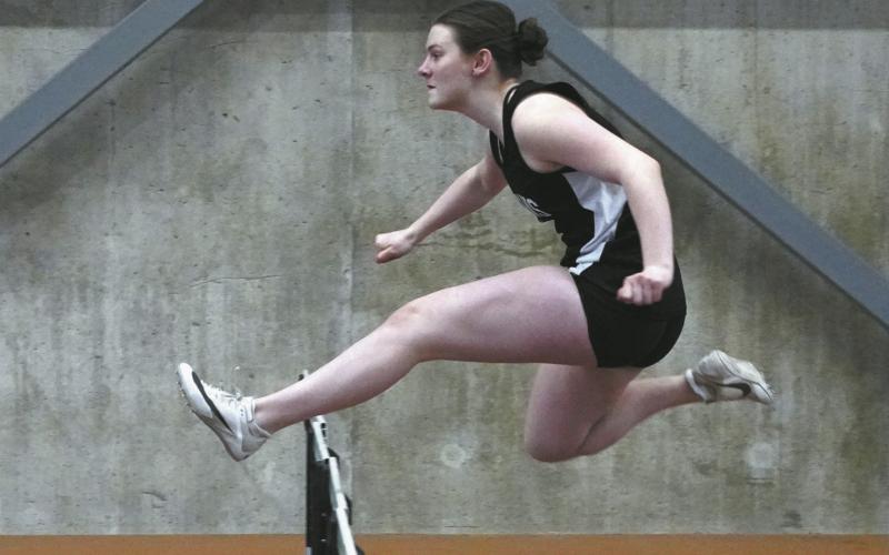 Jocelyn Vold placed second in high hurdles with a time of :10.38. Photo by Larry Stokke