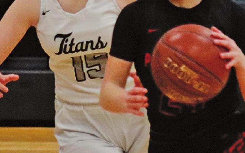 Aleah Pokrzywinski guards one of the Polar Bears during the Monday night matchup in Drayton. VNV photo by Lesa Van Camp
