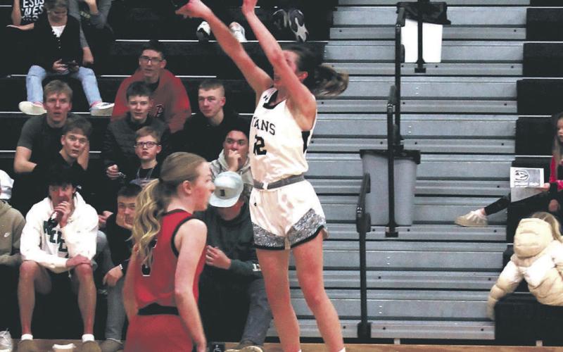 DVE junior Jaelyn Johnson goes for three. Photo by Jamie Rarick