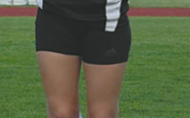 Alyssa Hoyles on the winner’s block. Photo by Larry Stokke.