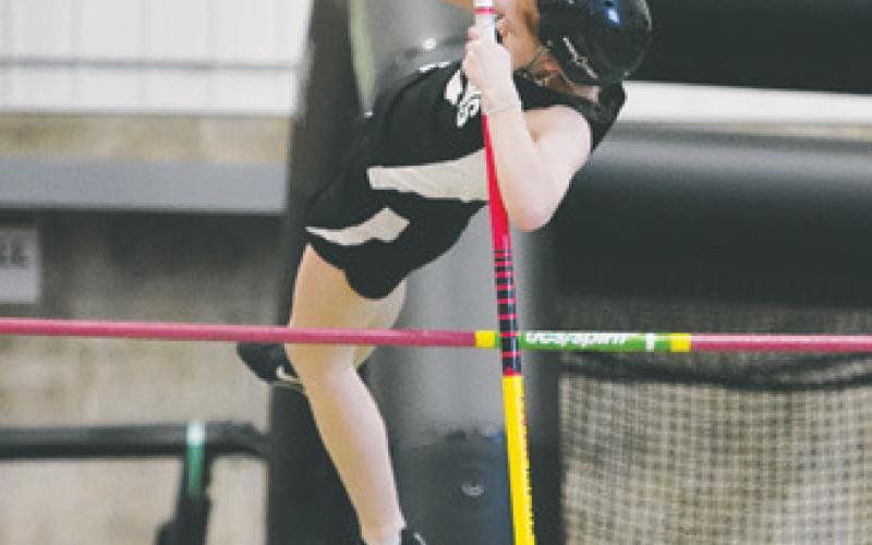 Alyssa Hoyles clearing the mark in pole vault.