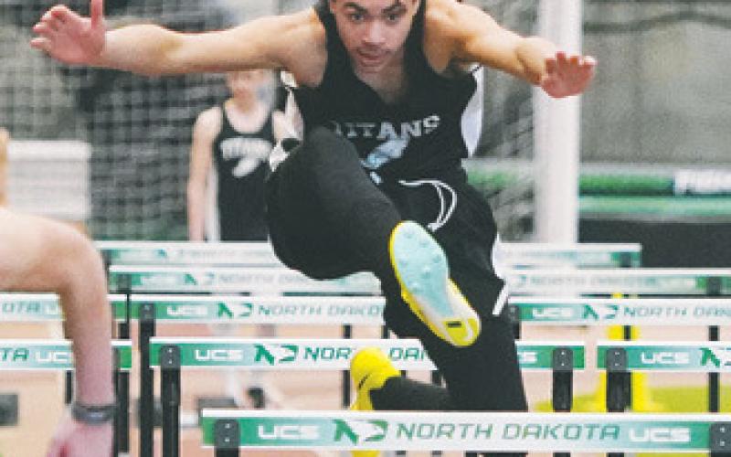 Mason Pollestad clearing a hurdle at last week's meet.