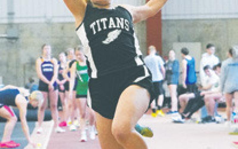 Reese Fering gives it her all in long jump.