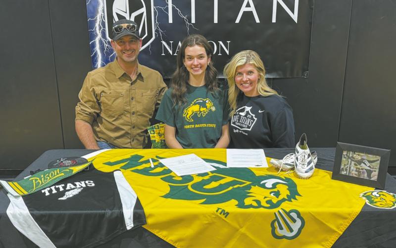 Elizabeth Fedje with parents, David and Jodi Fedje. Submitted photo