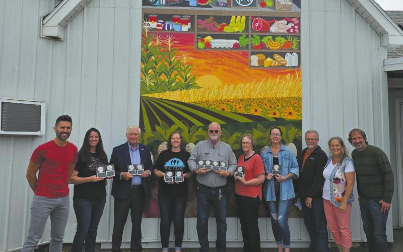 This years Best of the Rendezvous winners in front of the Rendezvous Region sponsored mural in Hoople. Photo courtesy of Rendezvous Region Tourism Council.