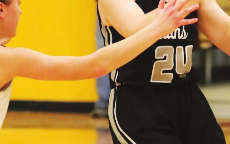 Kiara Aasand looks for an open Titan Saturday. VNV photo by Lyle Van Camp