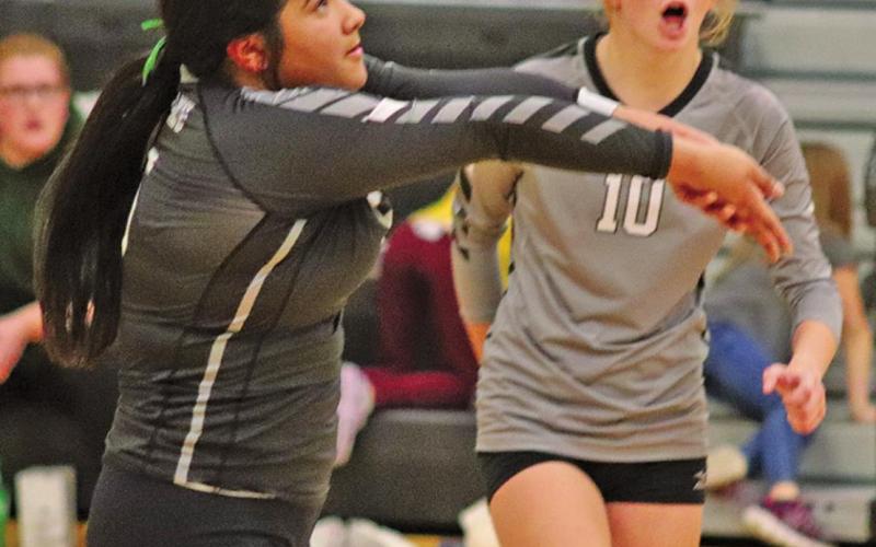 Emily Gonzalez bumps the ball from the back row in last Thursday’s match up against the Tommies. VNV Photo by Lesa Van Camp