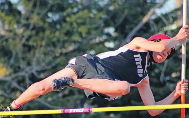 Gavin Ryan soars over the bar in the pole vault. Photo submitted by Drayton Public School