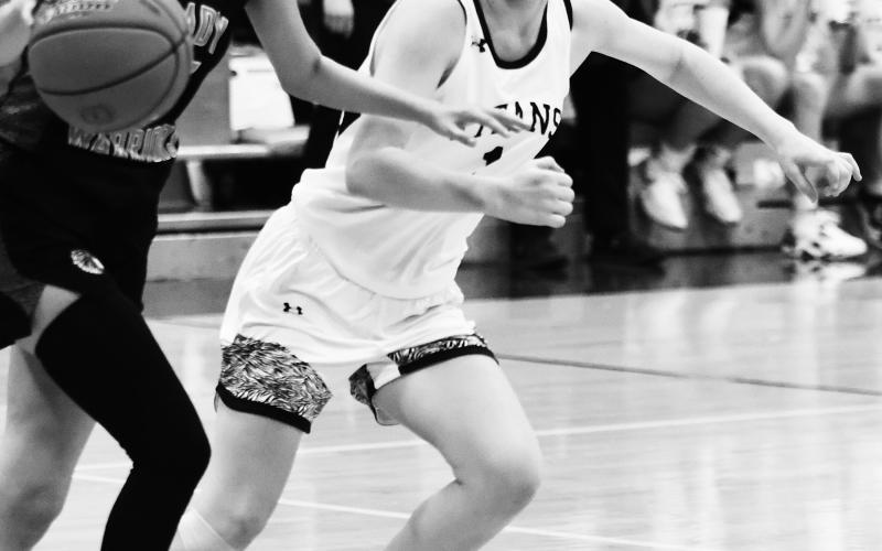Alyssa Hoyles plays strong defense against the Lady Warriors. Photo by Lyle Van Camp.