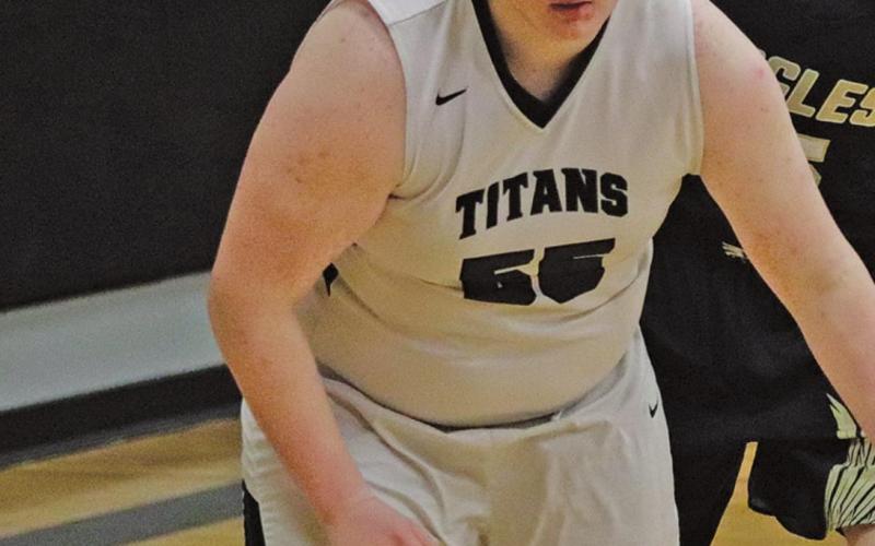 Joey Bjornson goes after a loose ball against North Border in the Drayton Gym last week. VNV Photo by Lesa Van Camp