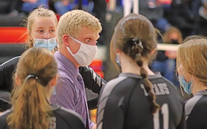 Coach Marcus Tucker talks to his team during the Play in match. VNV Photo by Lesa Van Camp