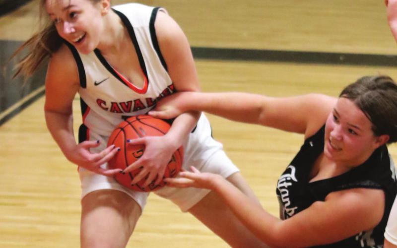 Hailey Berg fights for control of the ball in action at Cavalier. VNV photo by Lyle Van Camp