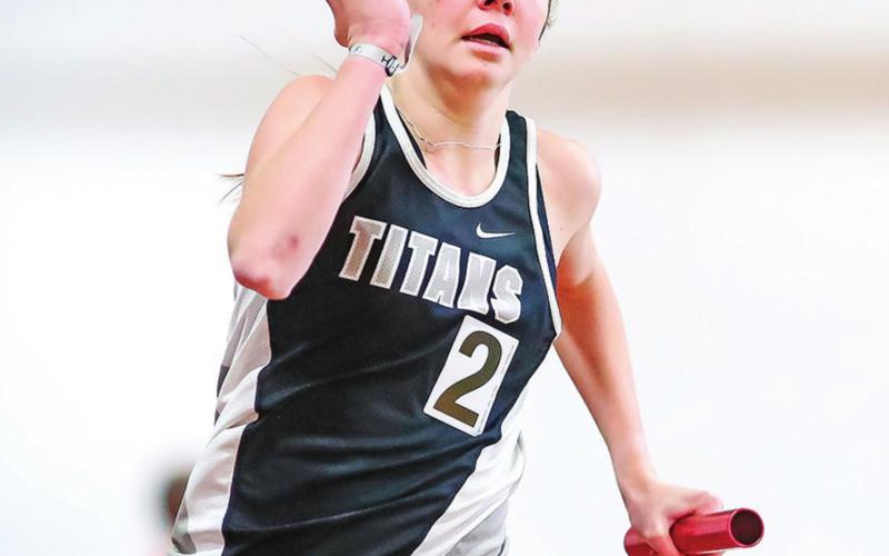 Easton Larson runs in a relay during the Cobber Indoor Track Meet at Concordia last Saturday. Photo by Cory Erickson Hillsboro Banner