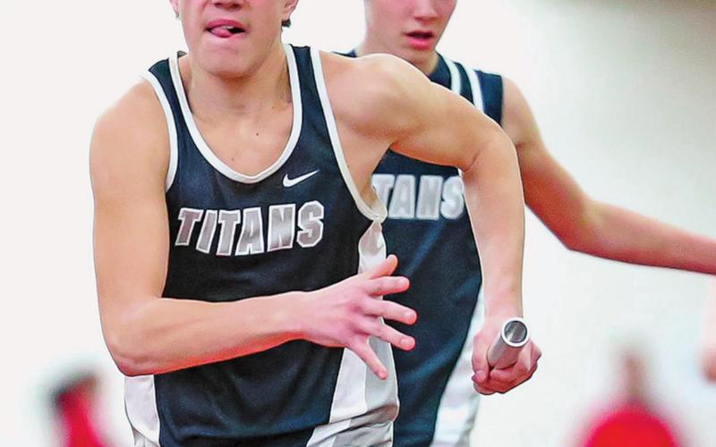 The passing of the baton between Isaac Feltman front and Brady Reilly behind him during a relay at the Cobber Indoor Track Meet. Photo by Cole Short Hillsboro Banner
