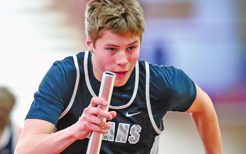 Pictured Above: Andrew Myrdal at the Indoor Concordia Track Meet runs his leg of the relay. Photo by Cole Short Hillsboro Banner