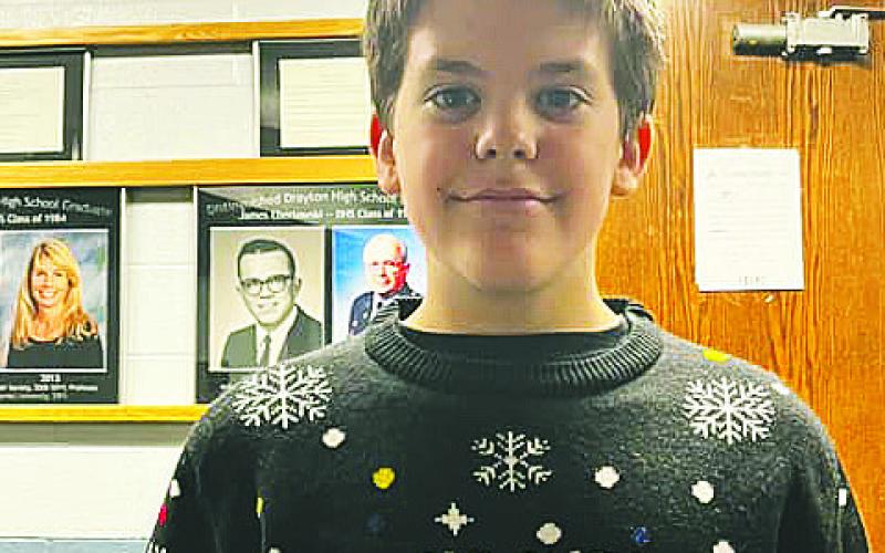 Gavin Cole in his ugly Christmas sweater Friday evening at the basketball game. Photo from Lauri Logsdon.