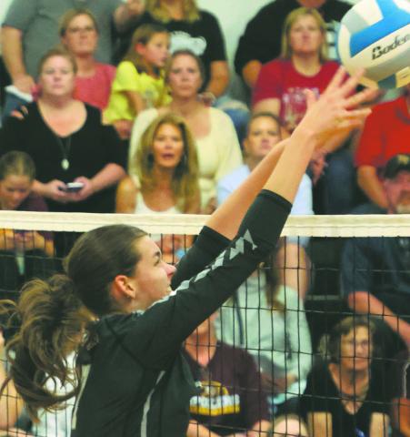 Elizabeth Fedje puts a kill attempt over the net in action in Drayton last week. Photo by Lyle Van Camp