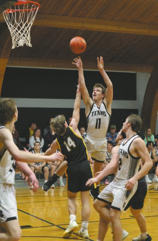 DVE senior Isaac Feltman releases the ball past PRFL defender Luke Shirek. Photo by Jamie Rarick