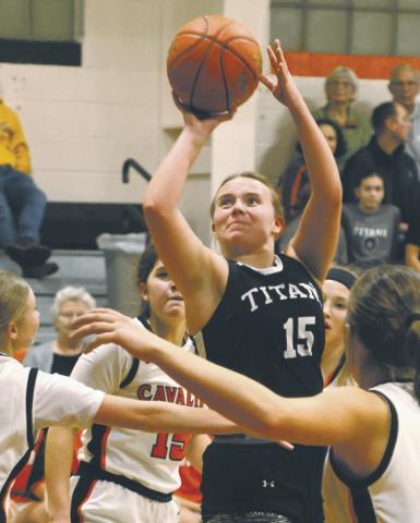Aleah Pokryzwinski shoots through a crowd in action at Cavalier last week. Photo by Lyle Van Camp