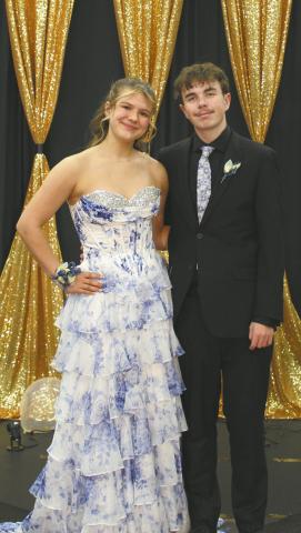 Violet Hoyles escorted by Bridger Latozke