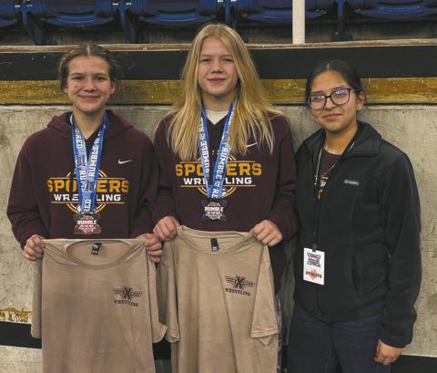 (L-R) Violet Hoyles (Drayton) placed third in the 124 weight class, Alyssa Hoyles (Drayton) placed second in the 130 weight class and Dylienna Solis (Grafton) did not place in her weight class at the Rumble on the Red Tournament in Fargo. Photo courtesy of Spoilers Wrestling