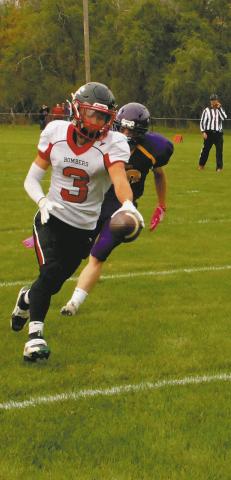 Trenten Keena extends the ball over the plane for a Bomber touchdown. Photo by Jamie Rarick