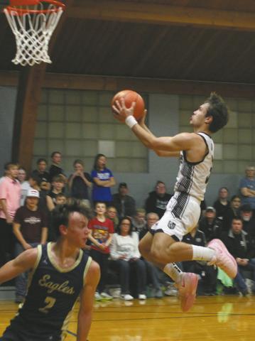 Sailing through the air, Trenten Keena lands the shot. Photo by Jamie Rarick