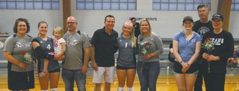 Greta Burrell, Reese Fering, and Hannah Myrdal with their parents on Parent’s night. Photo by Kerri Stegman