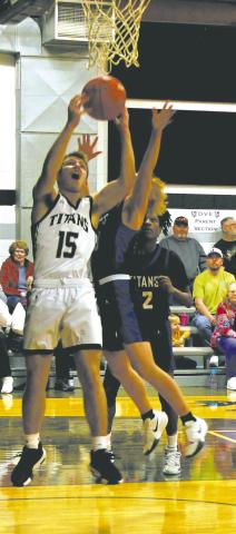 DVE’s Isaac Feltman recovers a rebound in Edinburg Feb. 8. Photo by Jamie Rarick