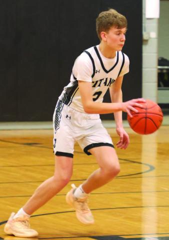 Quinn Passa brings the ball up the court against North Star.