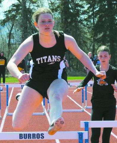 Ingrid Myrdal leaps over the hurdles with ease. Photo by Larry Stokke.
