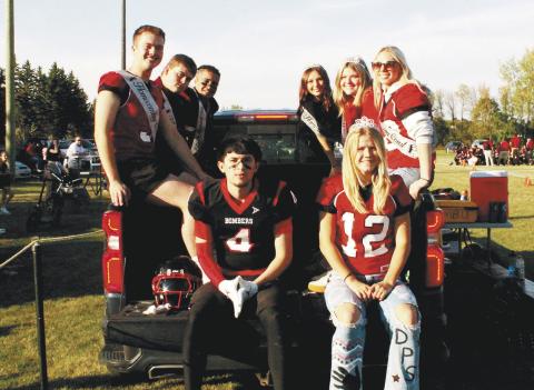 Members of the homecoming court rode along the sidelines during halftime of Saturday's game. Pictured: (On gate: King Trypp Castillo, Queen Alyssa Hoyles Back from left: Junior Attendant Maddox Oihus, Jaxon Wilson, Jerimiah Johnson, Taylor Hermanson, Alyvia Quibell, Junior Attendant Hope Patterson.) Photo by Jamie Rarick