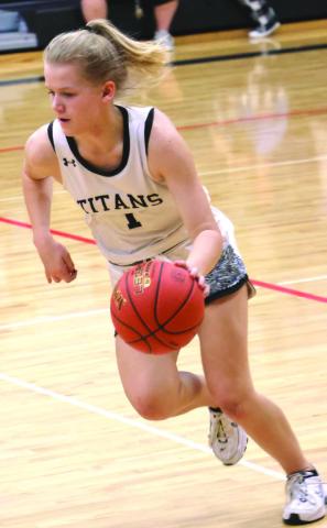 Alyssa Hoyles brings the ball up the court in action against Cavalier at Drayton.