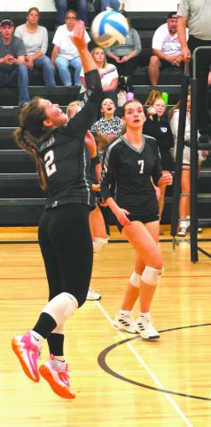 Brooke Gullickson goes for a kill in action against Hatton-Northwood last Tuesday in Drayton. Photo by Lyle Van Camp
