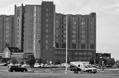 An ambulance departs the Sanford Medical Center in Fargo, North Dakota, on Sept. 13, 2025. Photo by Jeff Beach/North Dakota Monitor