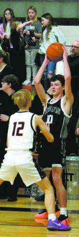 DVE Senior Brady Reilly looks for the open pass. Photo by Jamie Rarick