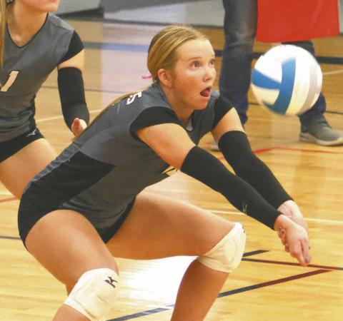 Easton Larson keeps on the ball as she receives a serve in action in Drayton on Tuesday evening of last week. Photo by Lyle Van Camp