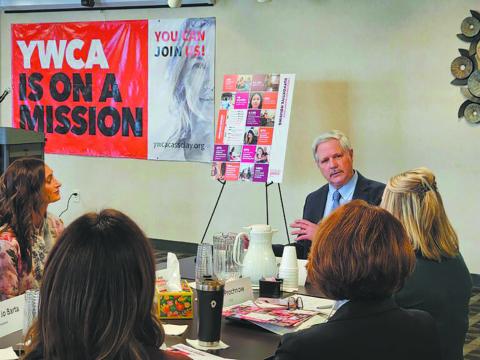 Sen. John Hoeven listens Feb. 20, 2026, as leaders from the YWCA in Fargo discuss helping the homeless. Photo by Jeff Beach/North Dakota Monitor