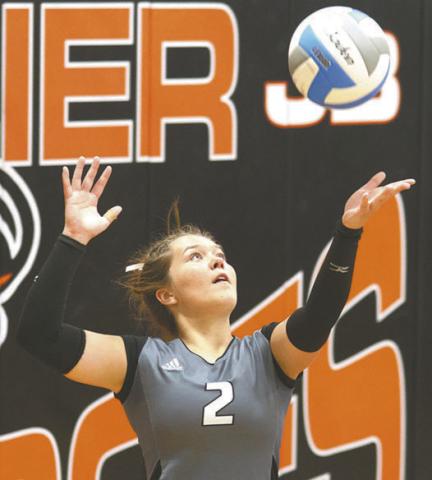 Brooke Gullickson serves against the Tornadoes. Photo by Lyle Van Camp
