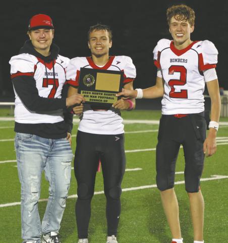 Team captains, Hunter Johnson, Trenten Bronson-Keena with the second place plaque. Photo by Lyle Van Camp